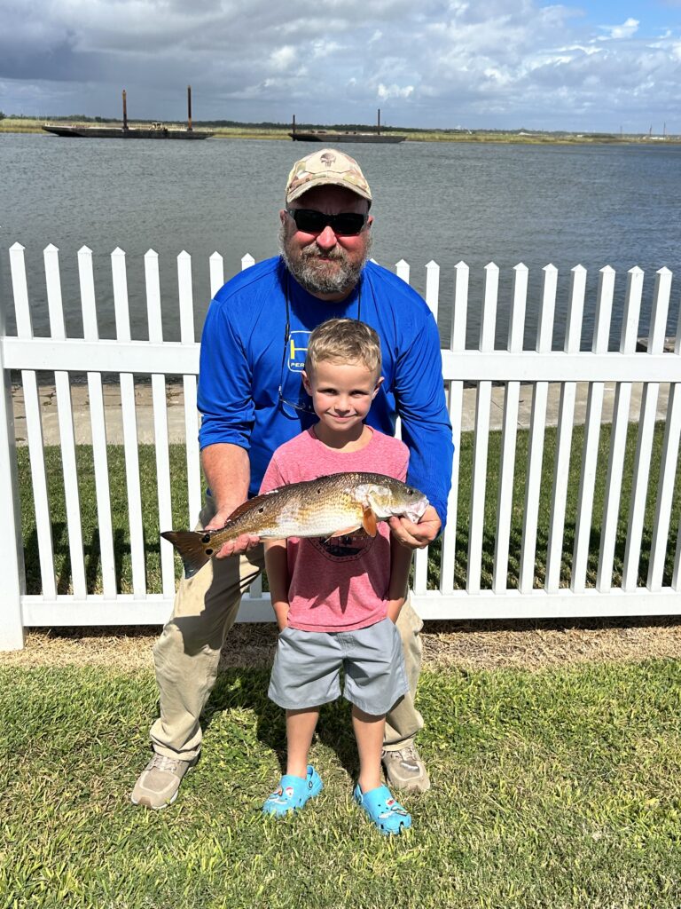 Catching reds with my grandson